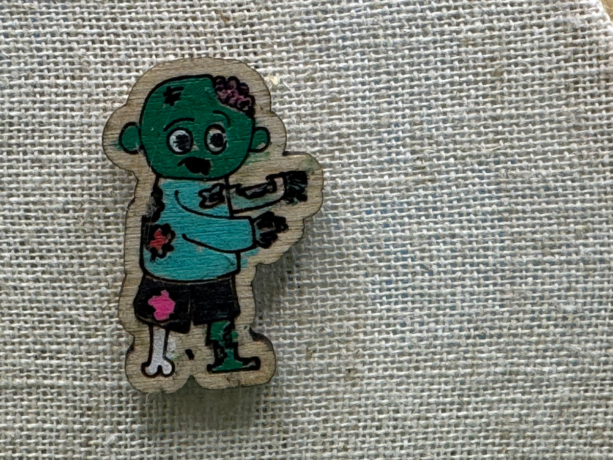 Sean, the (not quite dead yet) Zombie ! Hand Drawn Laser Cut Wooden Halloween Pin Badge