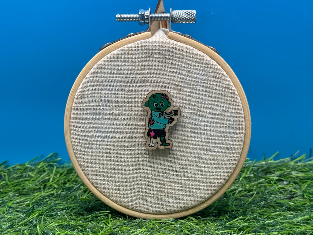 Sean, the (not quite dead yet) Zombie ! Hand Drawn Laser Cut Wooden Halloween Pin Badge