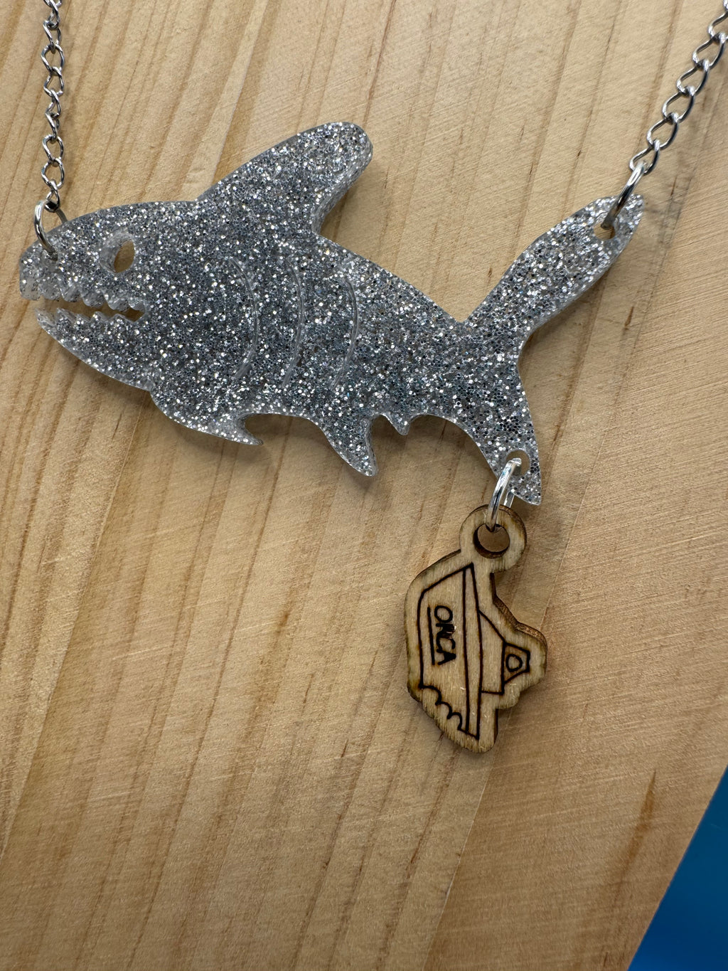 Bruce and The Orca - hand drawn, laser cut, wood and acrylic necklace