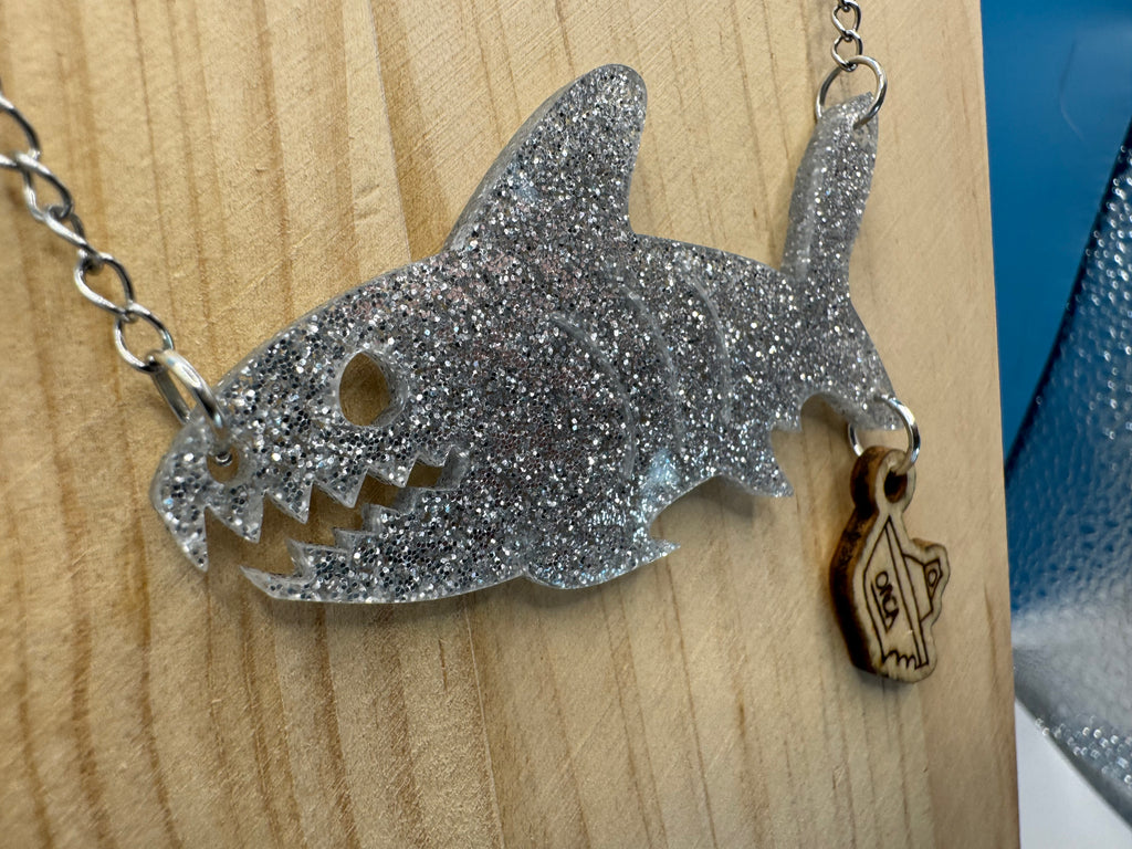 Bruce and The Orca - hand drawn, laser cut, wood and acrylic necklace