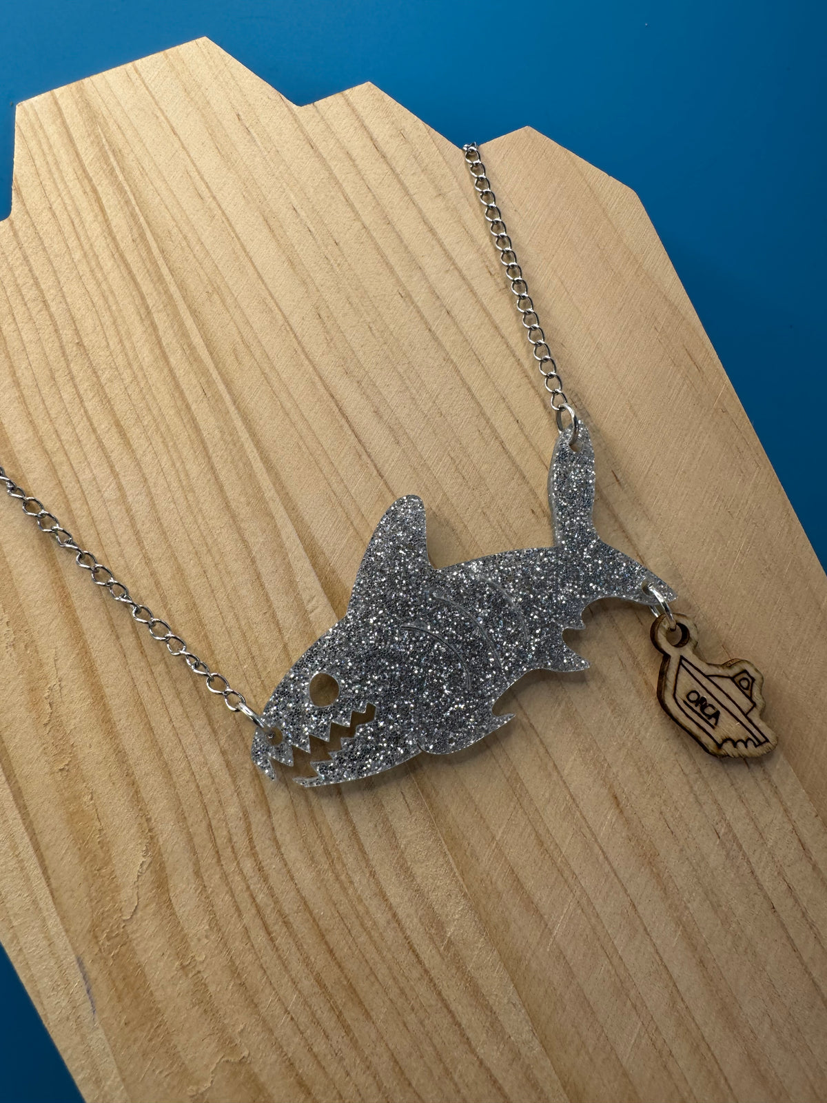 Bruce and The Orca - hand drawn, laser cut, wood and acrylic necklace
