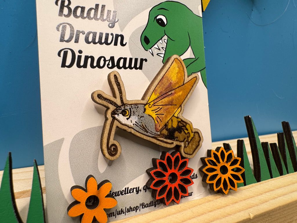 Hilary the Hummingbird Hawk Moth - hand drawn, laser cut wood pin badge